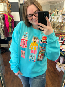 Turquoise Nutcracker Patch Pullover